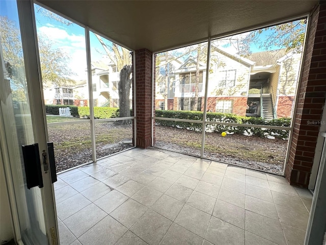 view of unfurnished sunroom