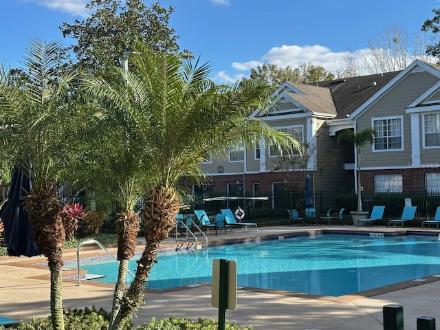 view of pool featuring a patio area