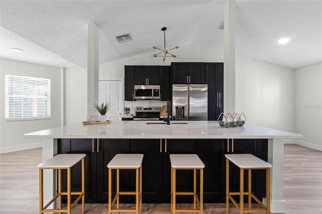 kitchen featuring a spacious island and appliances with stainless steel finishes