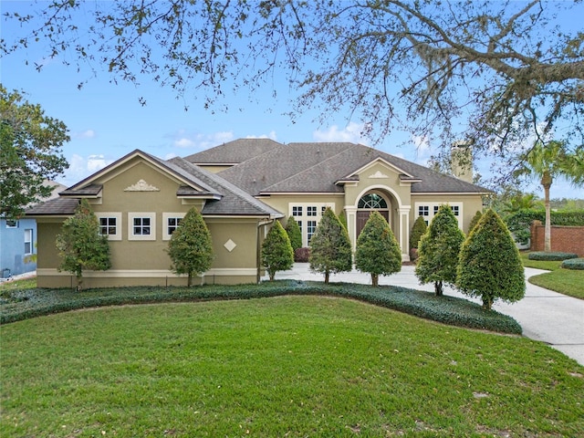 view of front of house with a front lawn