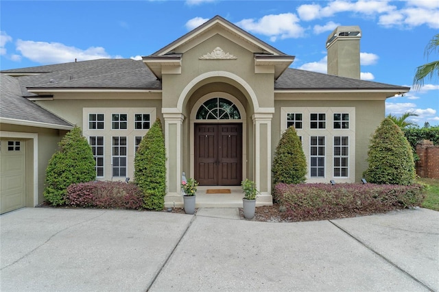 property entrance featuring a garage