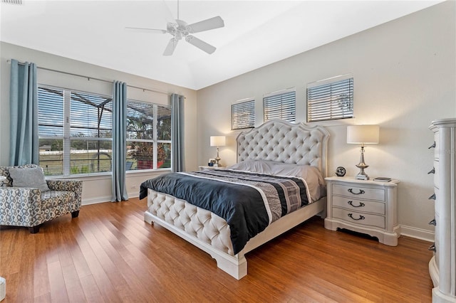 bedroom featuring hardwood / wood-style flooring and ceiling fan