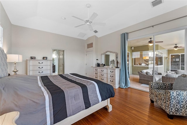bedroom featuring ceiling fan, wood-type flooring, and vaulted ceiling