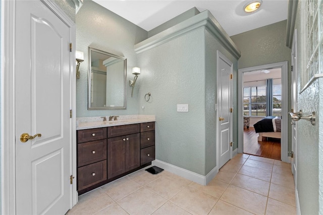 bathroom with vanity and tile patterned floors