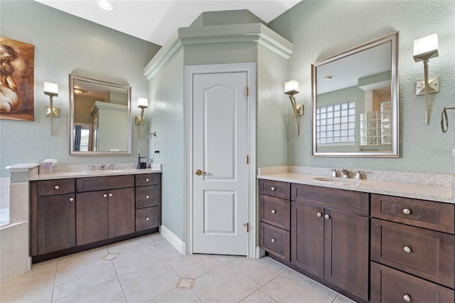 bathroom featuring tile patterned floors and vanity