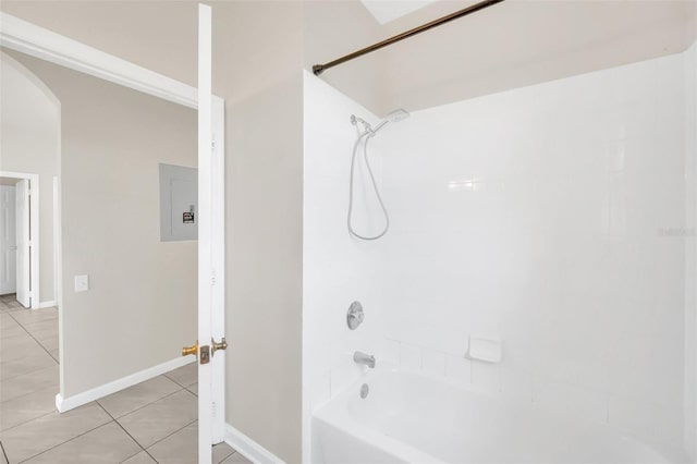 bathroom featuring shower / tub combination, electric panel, and tile patterned flooring