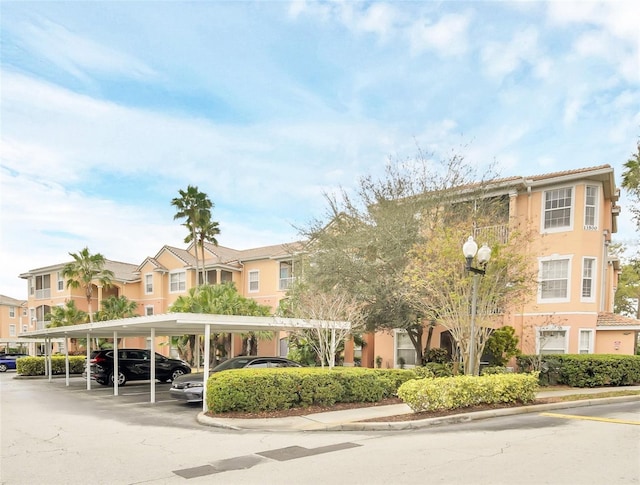 13500 Turtle Marsh Loop Unit 839, Orlando, FL 32837 - view of property with covered parking