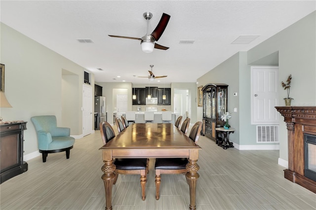 dining area featuring ceiling fan