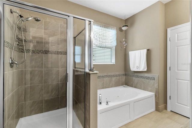 bathroom with shower with separate bathtub