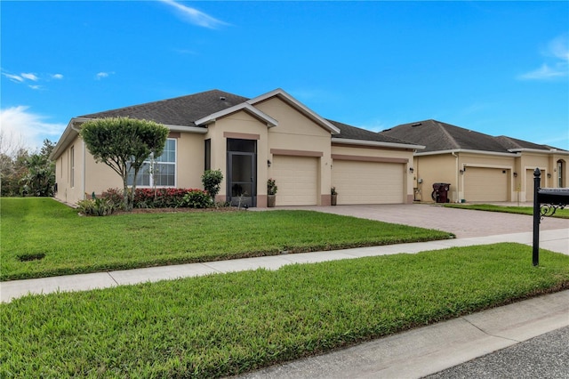 ranch-style home featuring a garage and a front yard