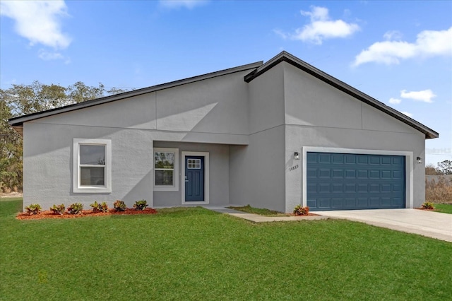 view of front of home with a garage and a front yard