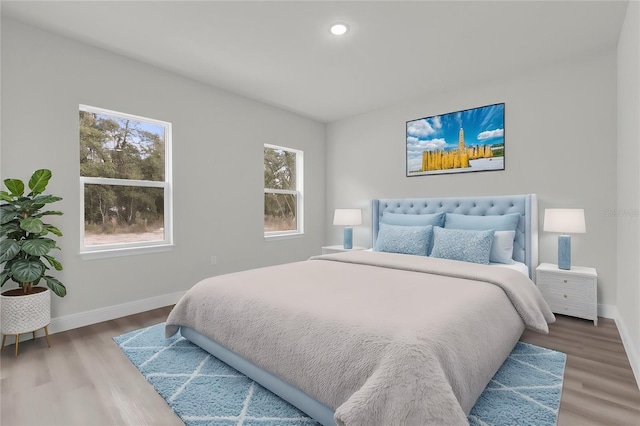 bedroom featuring hardwood / wood-style floors