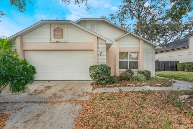 single story home with a garage