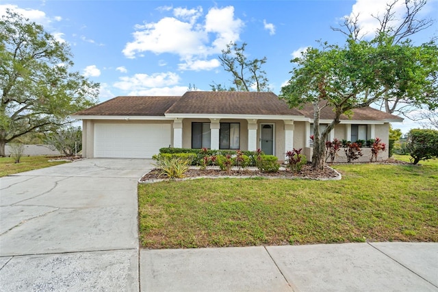 ranch-style home with a garage and a front lawn