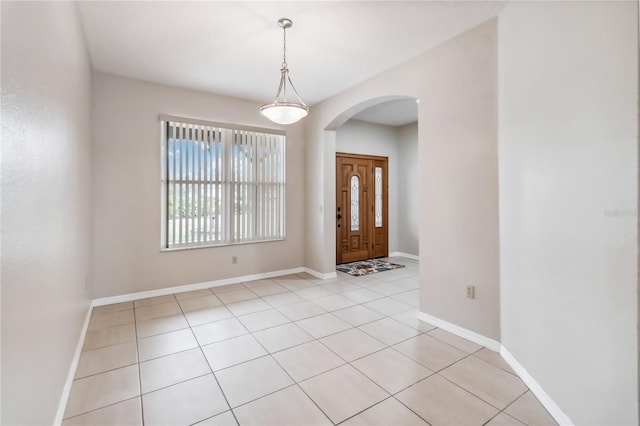 entryway featuring light tile patterned flooring