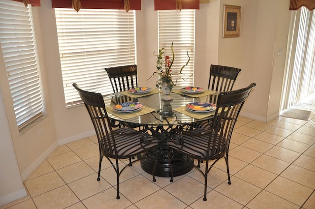 913 Henley Cir, Davenport, FL 33896 - tiled dining room with a wealth of natural light