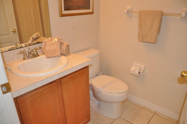 913 Henley Cir, Davenport, FL 33896 - bathroom featuring vanity, tile patterned flooring, and toilet