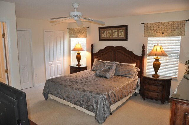 913 Henley Cir, Davenport, FL 33896 - bedroom with ceiling fan and light colored carpet