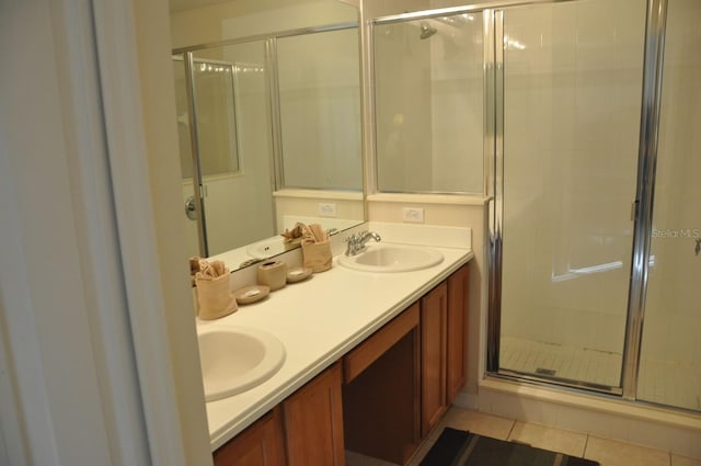 913 Henley Cir, Davenport, FL 33896 - bathroom with vanity, tile patterned floors, and walk in shower