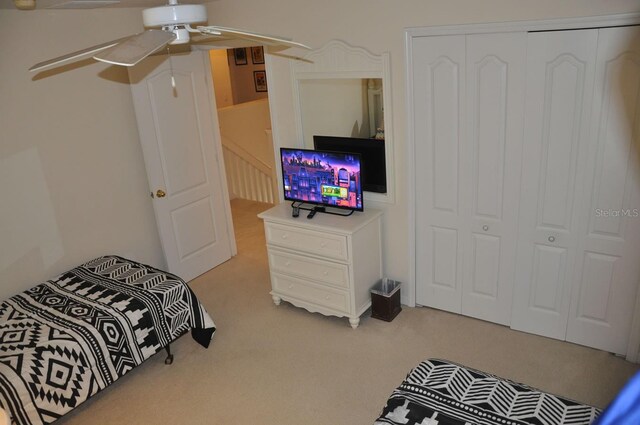 913 Henley Cir, Davenport, FL 33896 - bedroom featuring light colored carpet and a closet