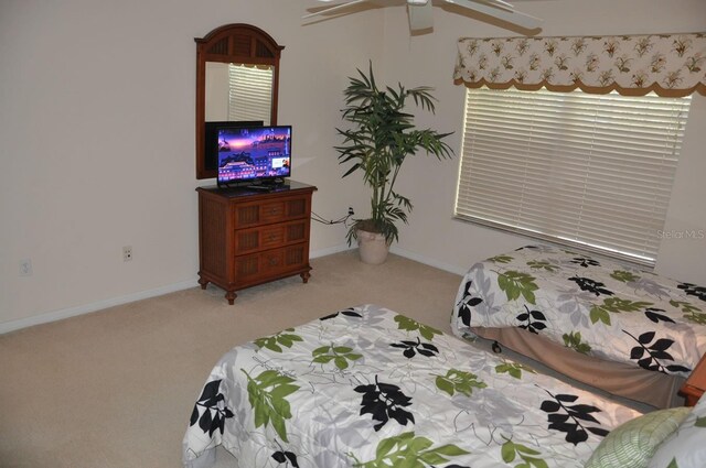 913 Henley Cir, Davenport, FL 33896 - carpeted bedroom featuring ceiling fan