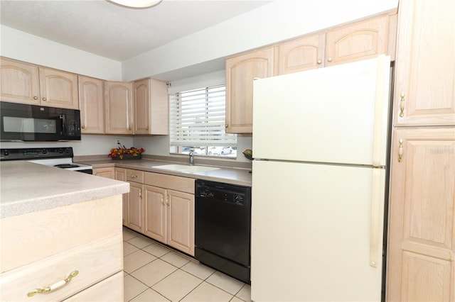 626 Orange Dr Unit 242, Altamonte Springs, FL 32701 - kitchen featuring light tile patterned flooring, sink, light brown cabinets, and black appliances
