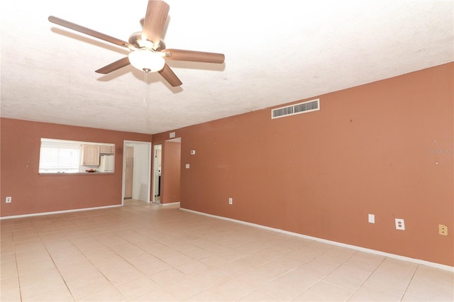 626 Orange Dr Unit 242, Altamonte Springs, FL 32701 - spare room with light tile patterned floors, a textured ceiling, and ceiling fan