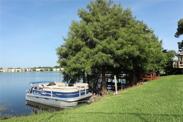 626 Orange Dr Unit 242, Altamonte Springs, FL 32701 - view of dock with a water view and a lawn