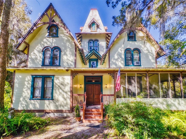 victorian home with a sunroom