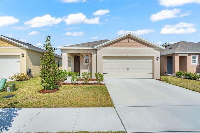 ranch-style home featuring a garage and a front yard