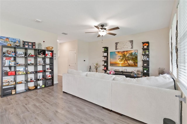 living room with ceiling fan