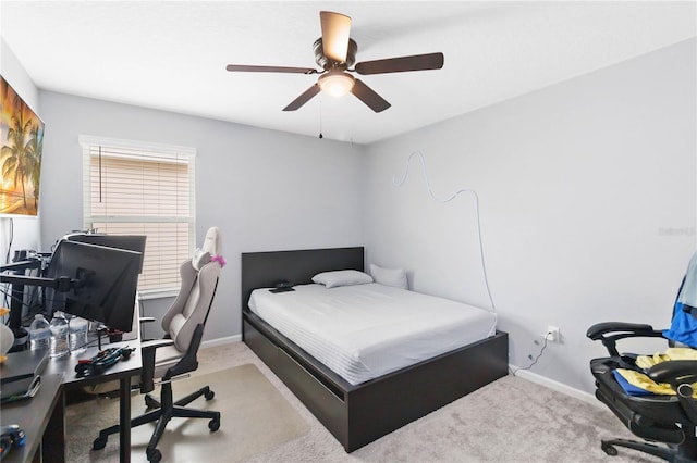 bedroom featuring ceiling fan and carpet flooring