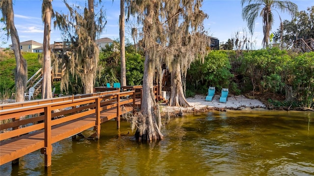 view of dock with a water view