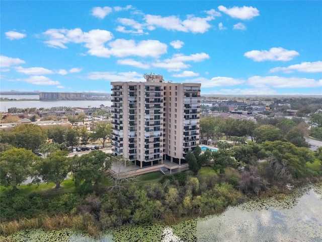 view of building exterior with a water view