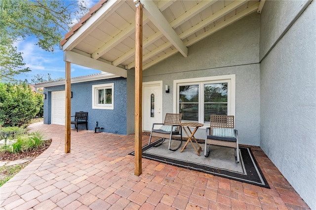 view of patio / terrace with a garage