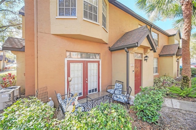 doorway to property featuring french doors