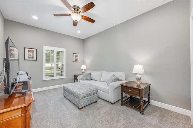 carpeted living room with baseboards, a ceiling fan, and recessed lighting