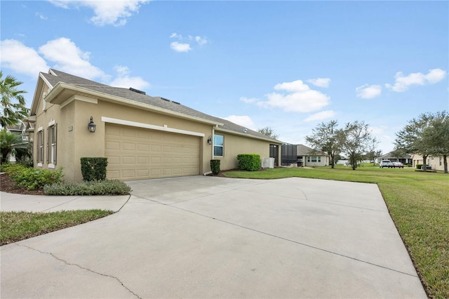 view of side of home with a garage, concrete driveway, a lawn, and stucco siding