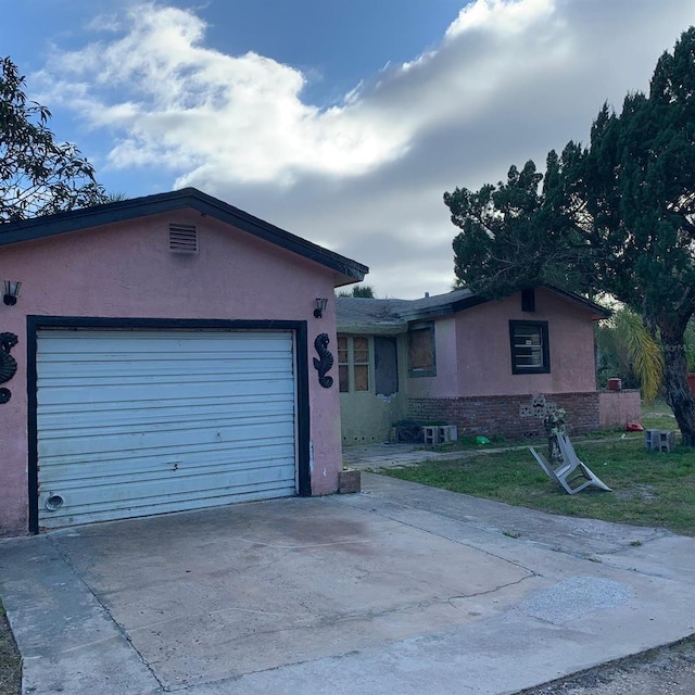 ranch-style house with a garage