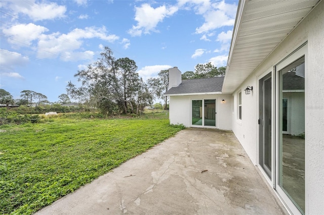 1001 Glencove Ave NW, Palm Bay, FL 32907 - view of yard with a patio area