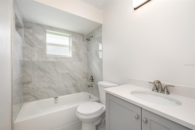 1001 Glencove Ave NW, Palm Bay, FL 32907 - bathroom featuring toilet, vanity, and washtub / shower combination
