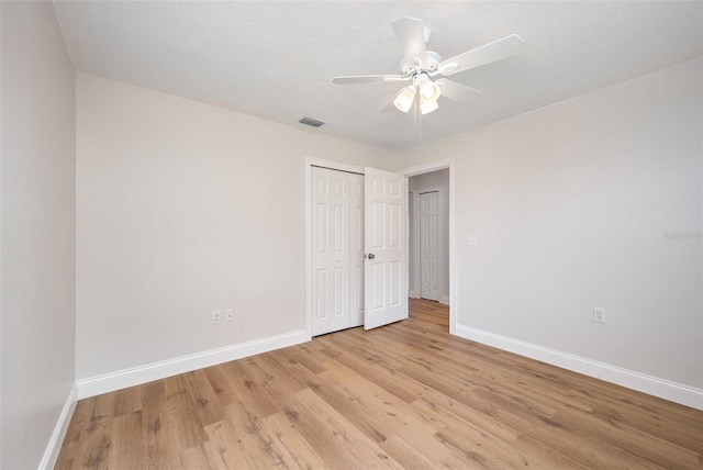 1001 Glencove Ave NW, Palm Bay, FL 32907 - unfurnished bedroom featuring light wood finished floors and baseboards