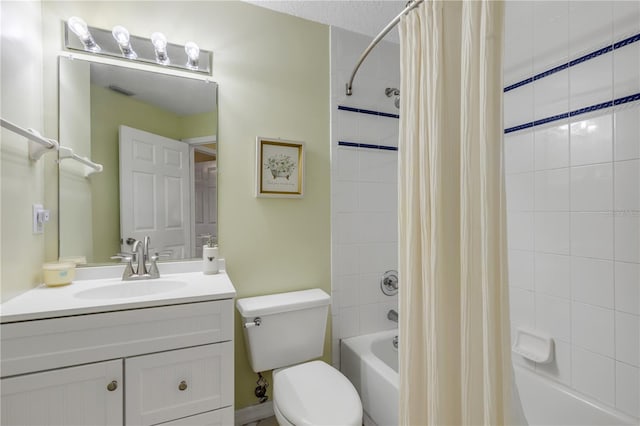 full bathroom featuring shower / bath combination with curtain, vanity, and toilet