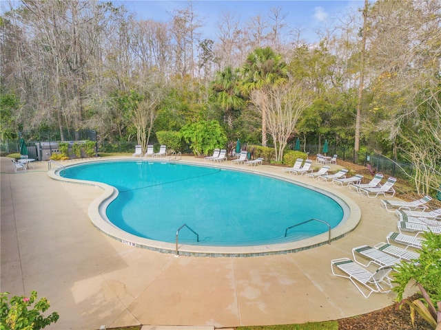 view of pool featuring a patio