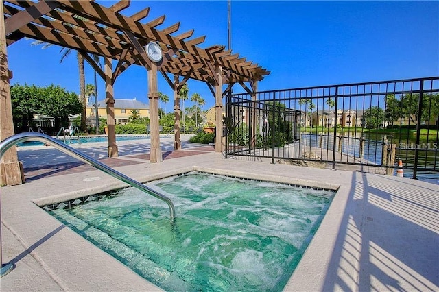 view of swimming pool featuring a pergola