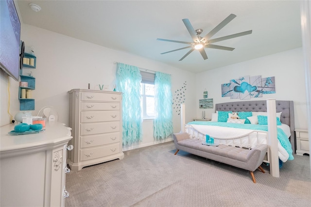 bedroom with ceiling fan and carpet floors