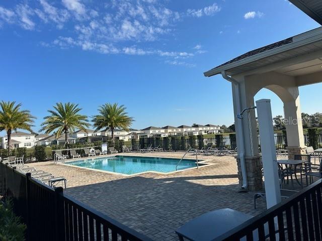 view of pool featuring a patio area