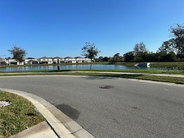 view of road featuring a water view