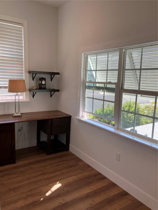 1611 Chestnut Ave, Winter Park, FL 32789 - unfurnished office with baseboards and dark wood-style floors