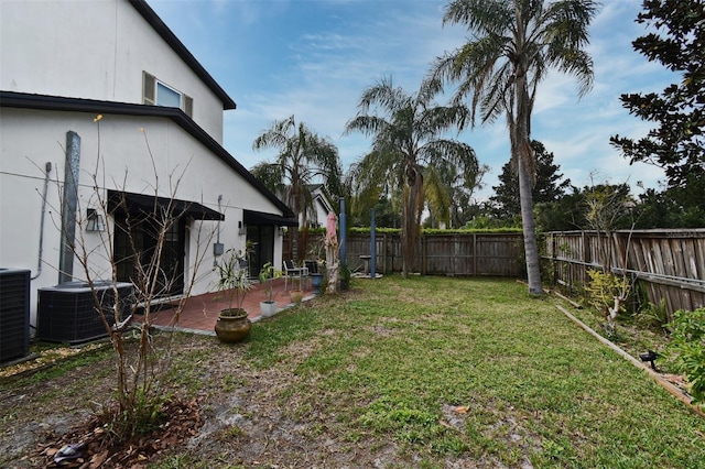 1611 Chestnut Ave, Winter Park, FL 32789 - view of yard featuring central AC unit and a patio area